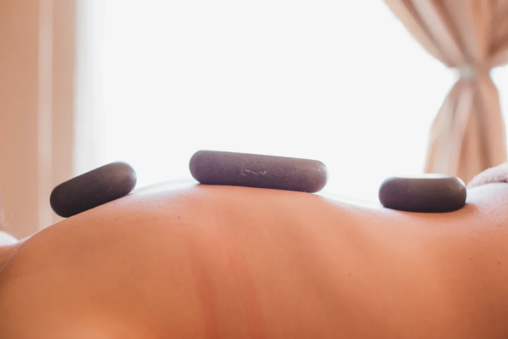 Hot Stone Massage | Sommnest App | Massage Therapists | Licensed Massage Therapists | Stress and Anxiety Reduction