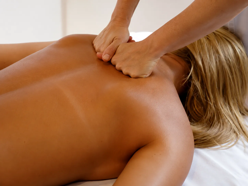 Client receiving a deep tissue massage session for chronic back pain relief